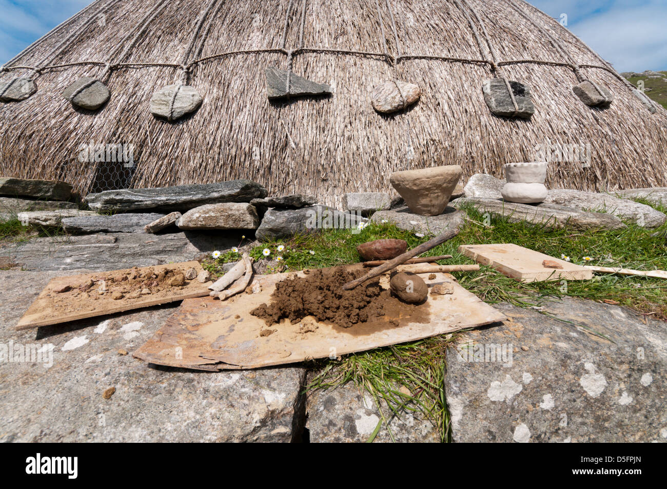 Pottery at Bosta replica iron-age house which has been prepared using traditional methods of the time. Stock Photo