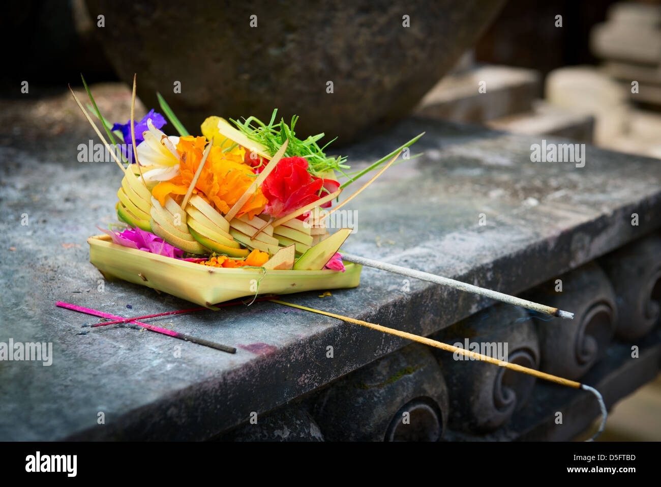 Traditional balinese offerings to gods in Bali with flowers and ...