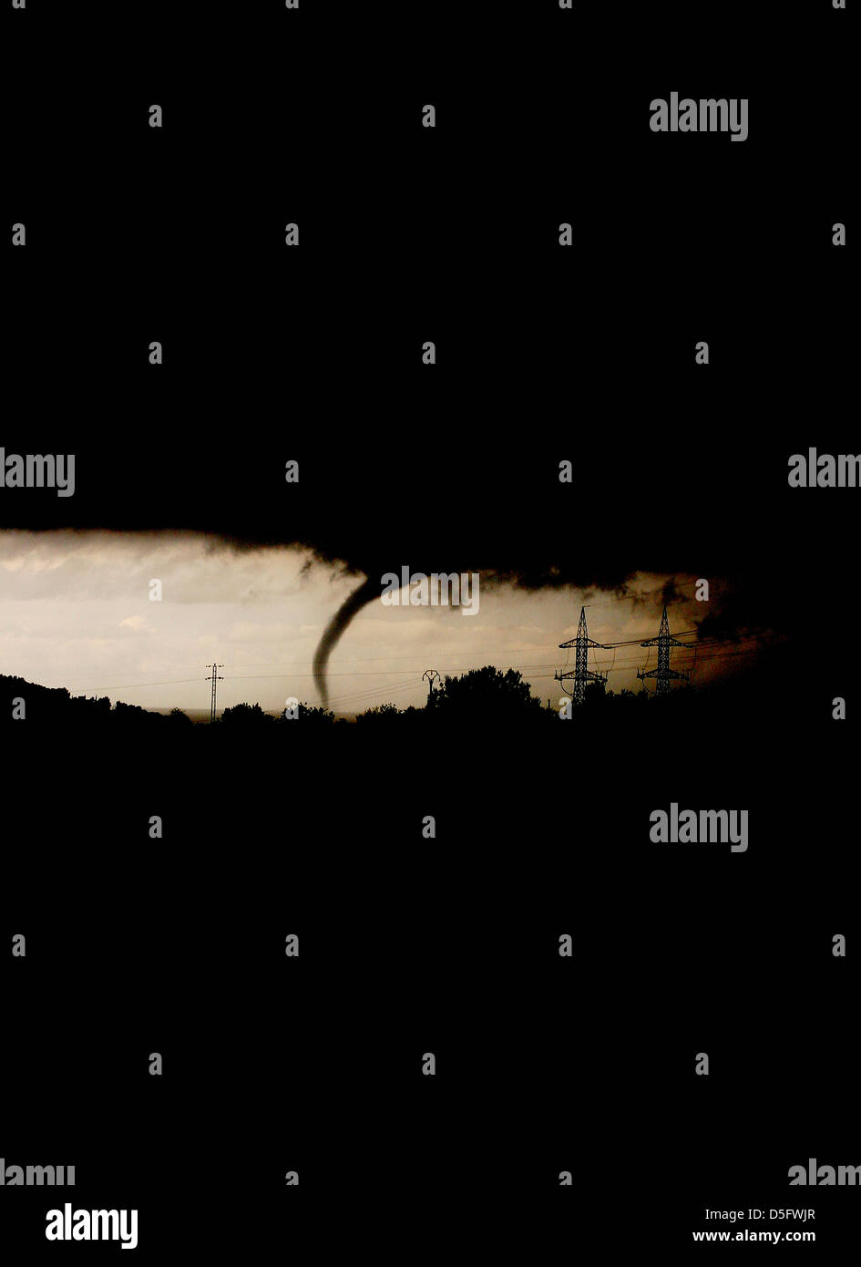 A small tornado hits the ground during a heavy storm in the Spanish island of Mallorca Stock Photo
