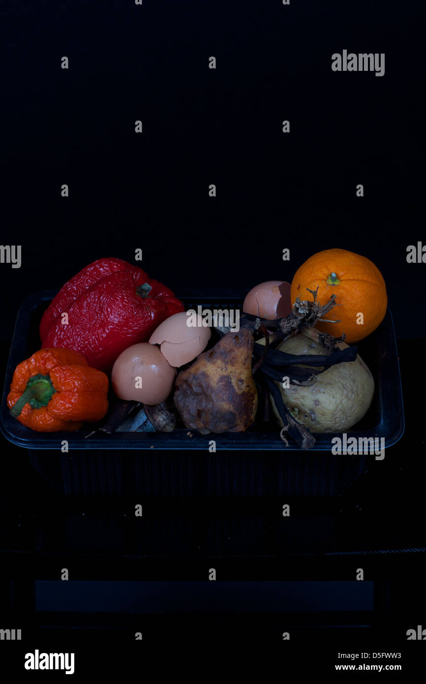 rotting fruit and vegetables with a black background Stock Photo