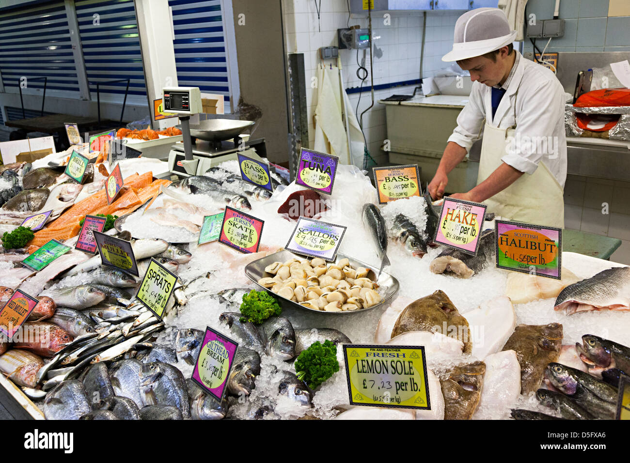 Fresh fish on sale in fishmonger, indoor market, St Helier, Jersey, Channel Islands, UK Stock Photo