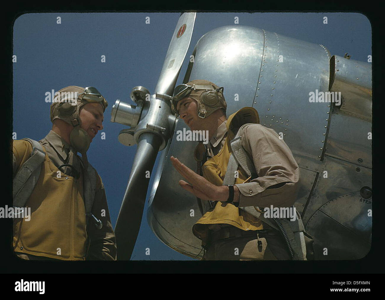 Marine lieutenants, pilots, by the power towplane for the training