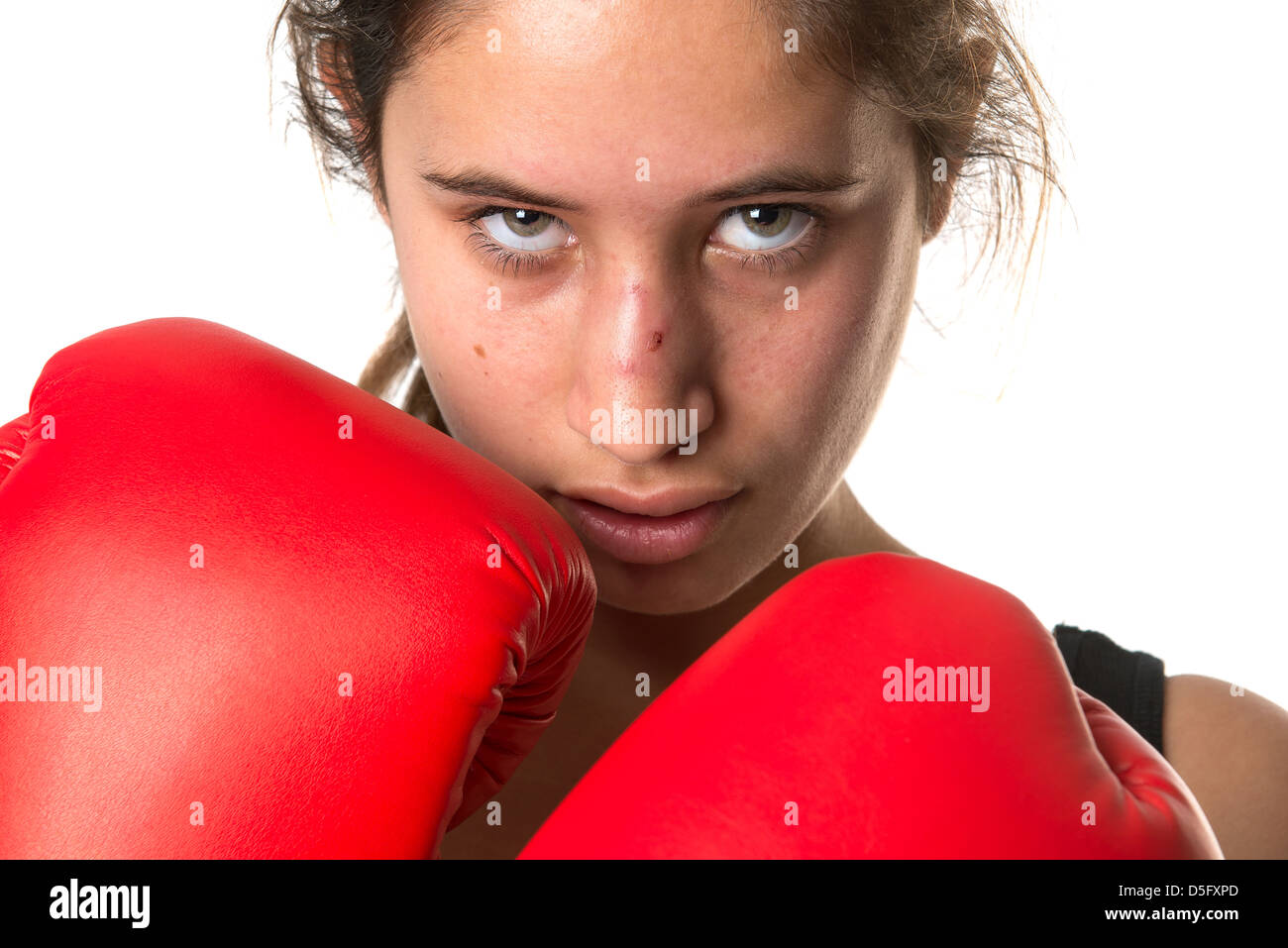 Young girl boxer posing with gloves isolated in white Stock Photo Alamy