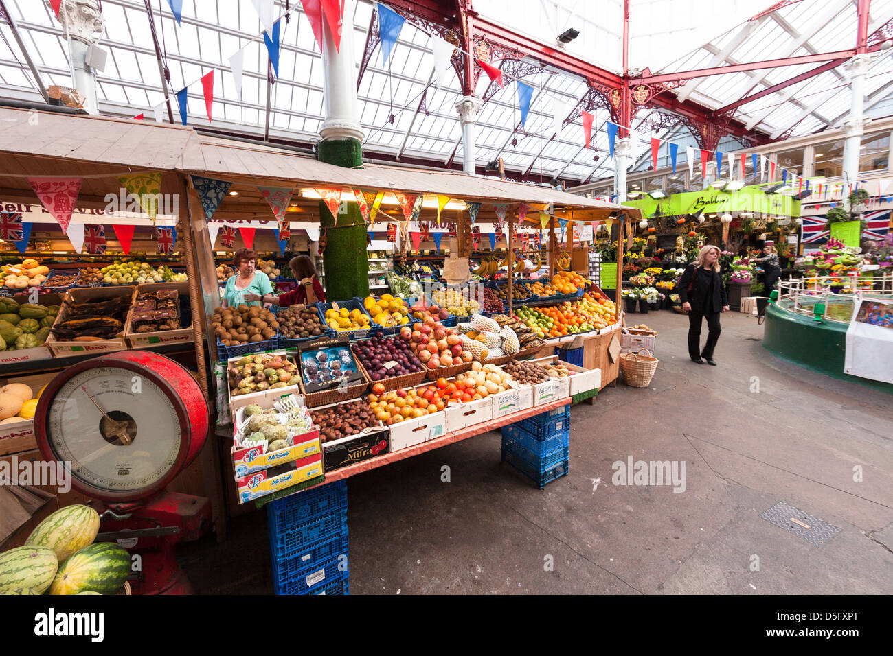Fruit and veg on sale in indoor covered market, St Helier, Jersey