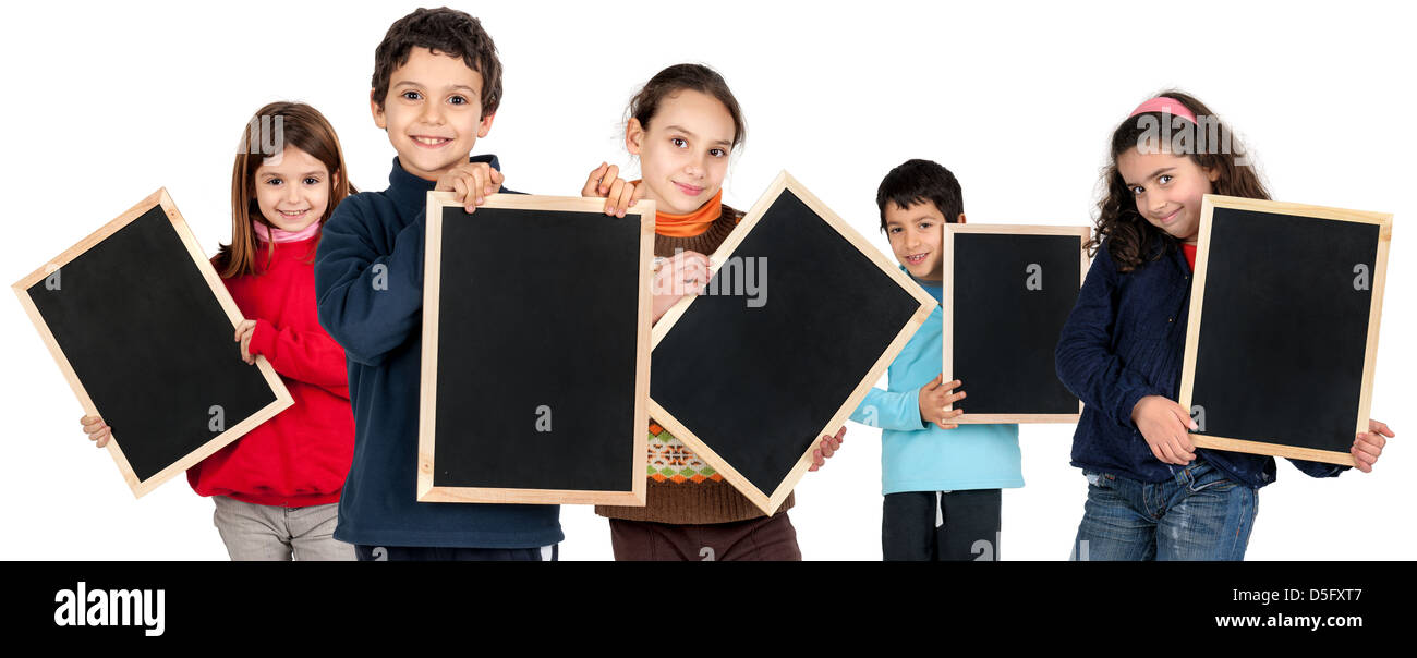 Group of children with black boards isolated in white Stock Photo