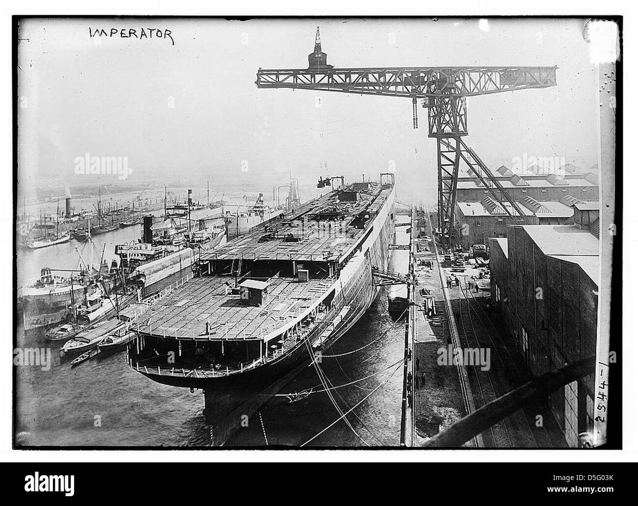 The RMS Imperator, an ocean liner originally built by AG Vulcan, was part of the Hamburg-Amerikanische Packetfahrt-Actien-Gesellschaft, later serving as a troop transport ship under the U.S. Navy during World War II. Stock Photo