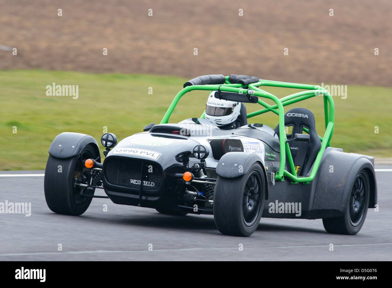 A car racing around Castle Combe Circuit at the Bristol Motor Club's ...