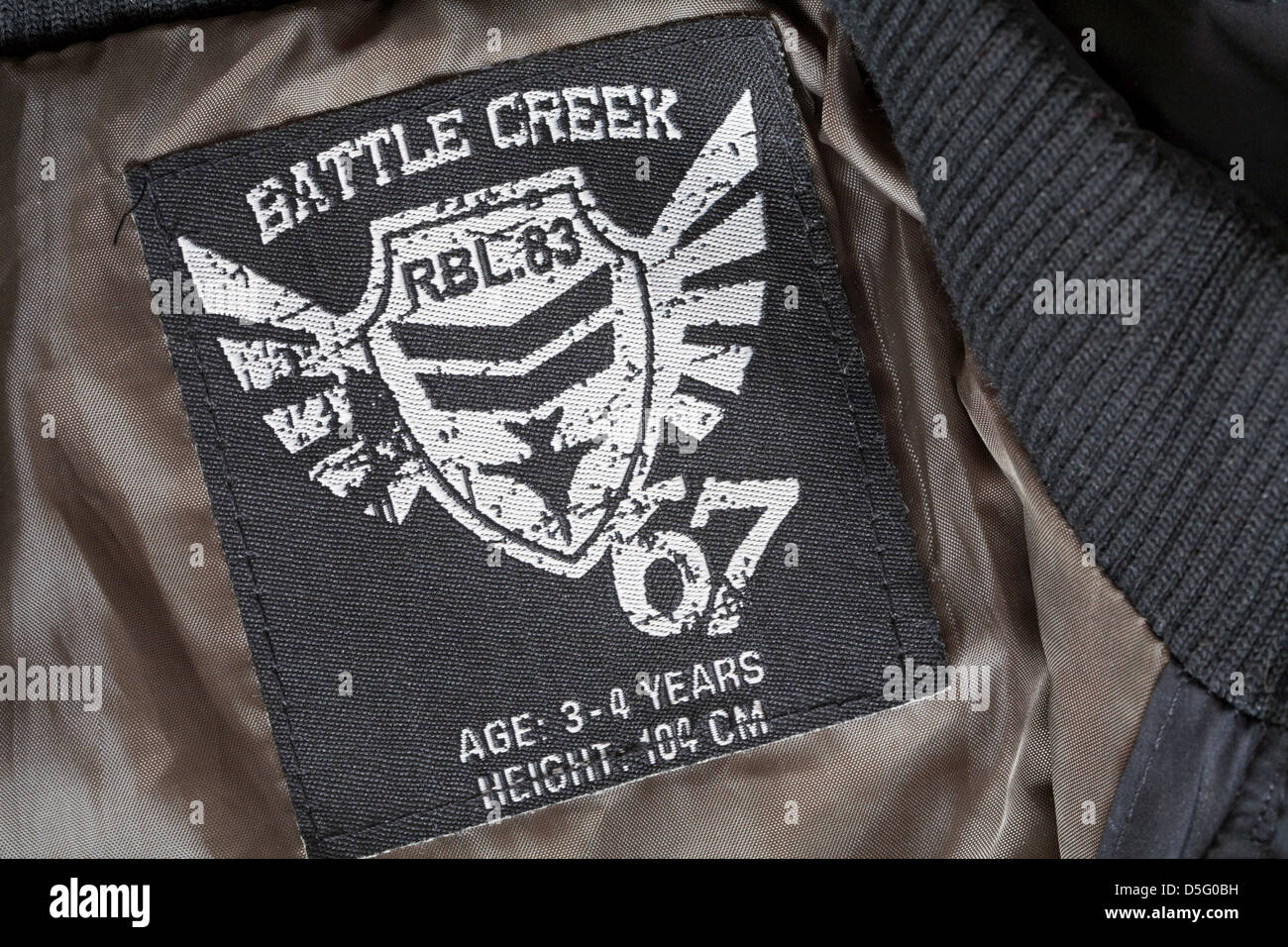 Battle Creek label in boys jacket garment clothing sold in the UK United Kingdom Great Britain Stock Photo