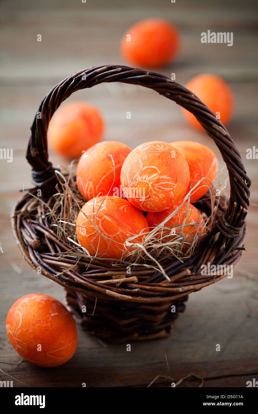 Bright orange easter eggs with selective focus Stock Photo