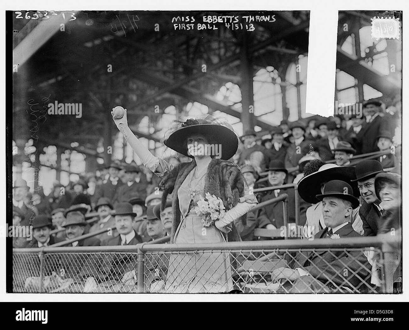 [Miss Genevieve Ebbets, youngest daughter of Charley Ebbets, throws first ball at opening of Ebbets Field (baseball)] (LOC) Stock Photo
