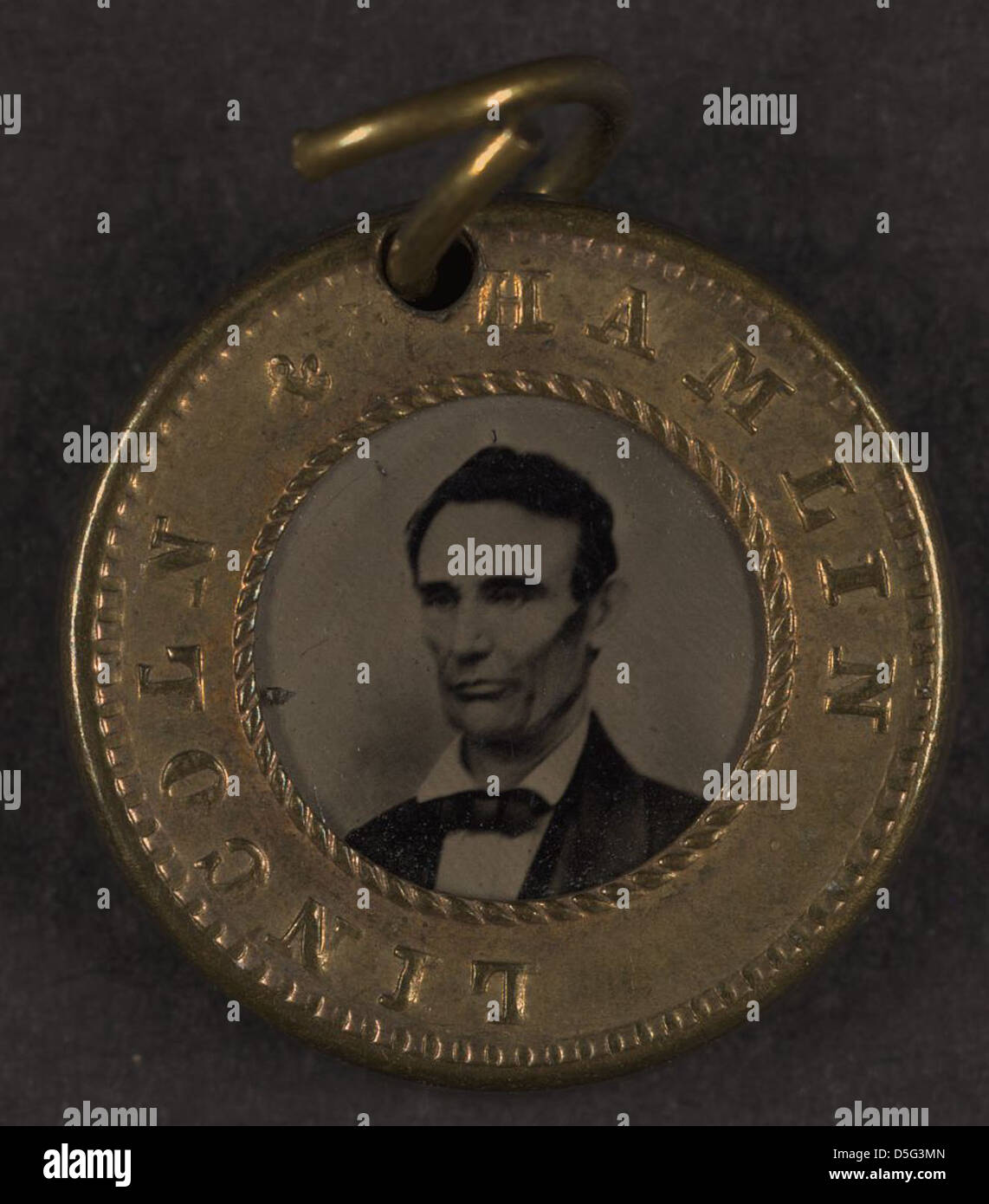 A campaign button from the 1860 presidential race featuring portraits of Abraham Lincoln and his running mate Hannibal Hamlin. This button represents the early days of the Republican Party and their bid for the White House. Stock Photo