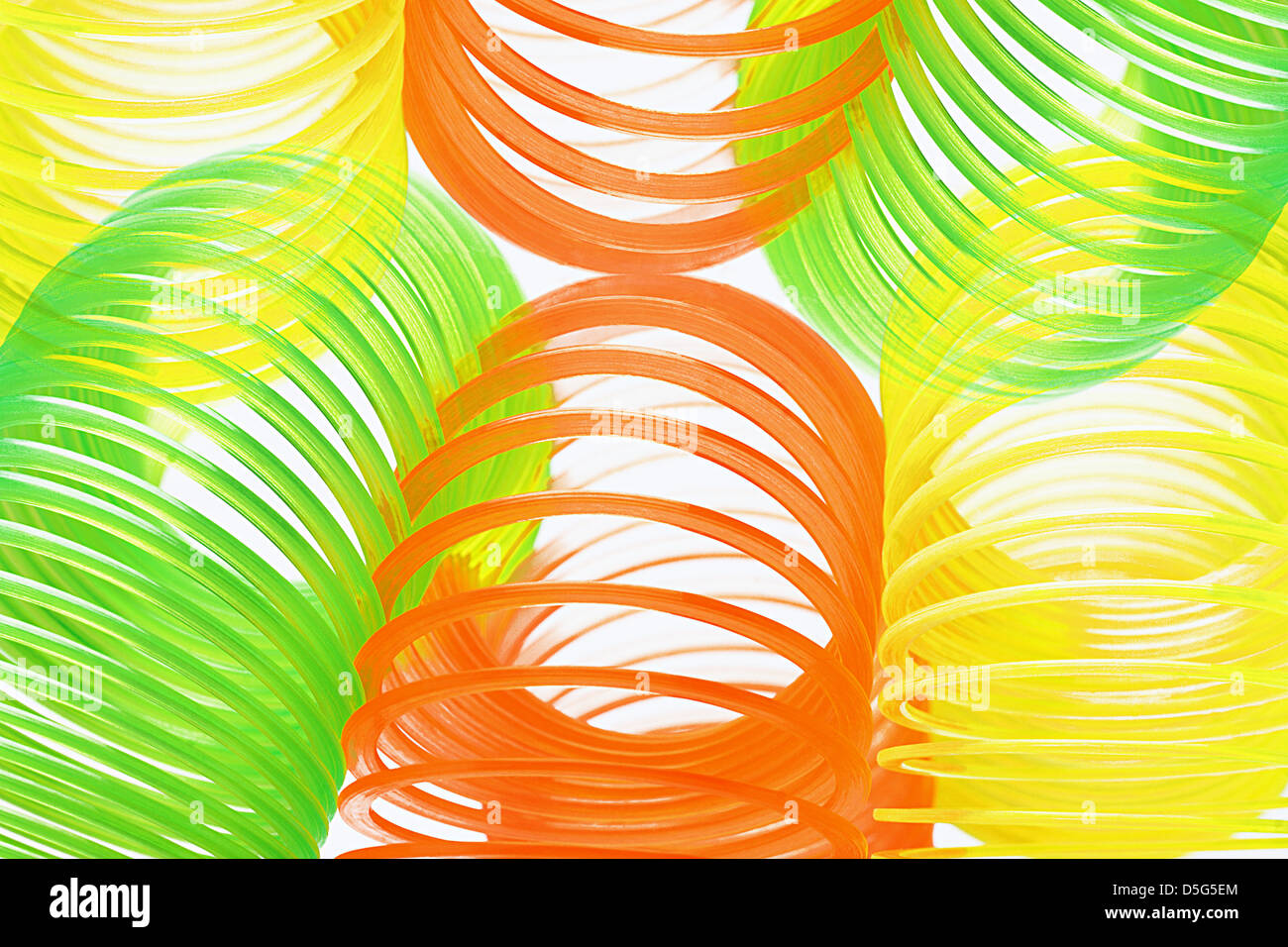 Colorful Plastic Springs Background Stock Photo