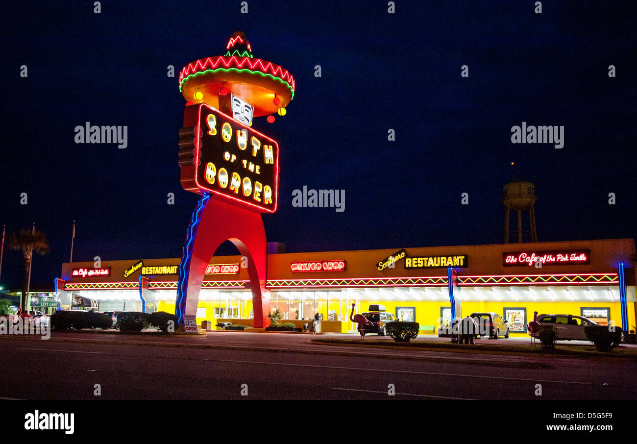 aSouth of the Border lit up at night on interstate 95 in South Carolina Stock Photo