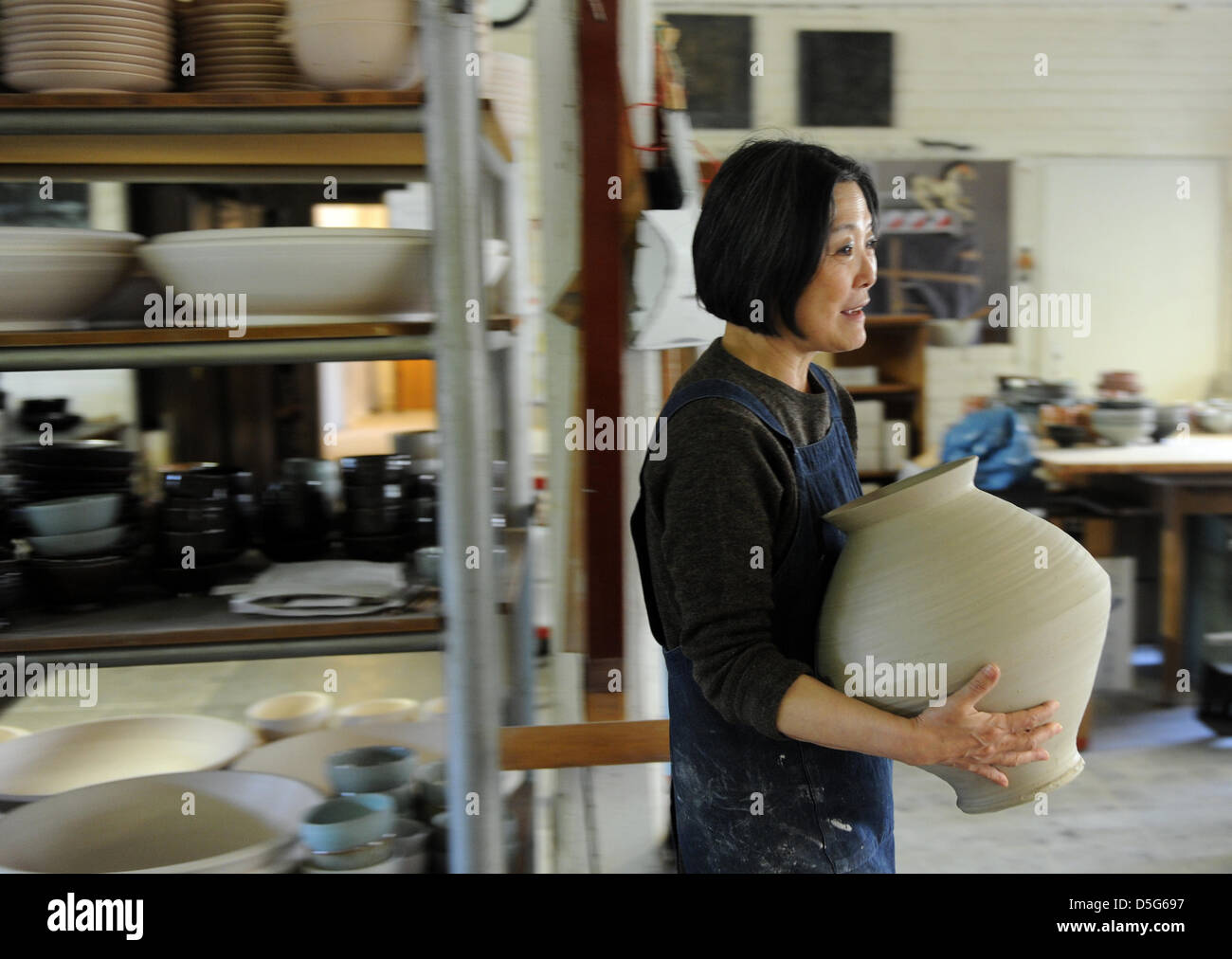 The Manager Of The Ceramic Studio Margaretenhohe Young Jae Lee Works In The Atelier In Essen Germany 27 March 2013 Together With Six Colleagues She Produces Vases Bowls And Tea Pots Made Of