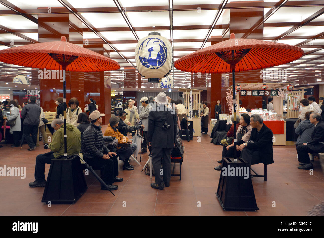 April 2, 2013, Tokyo, Japan - Keepsake hunters browse around the souvenir shop attached to the revamped Kabuki Theater on its grand opening day in Tokyo's shopping-entertainment district of Ginza on Tuesday, April 2, 2013.  After three years of renovation, the new theater which retains the Japanese-style facade of its previous incarnations raised its curtain with a three-month long run of Japan's centuries-old performing arts of Kabuki.  (Photo by Natsuki Sakai/AFLO) Stock Photo