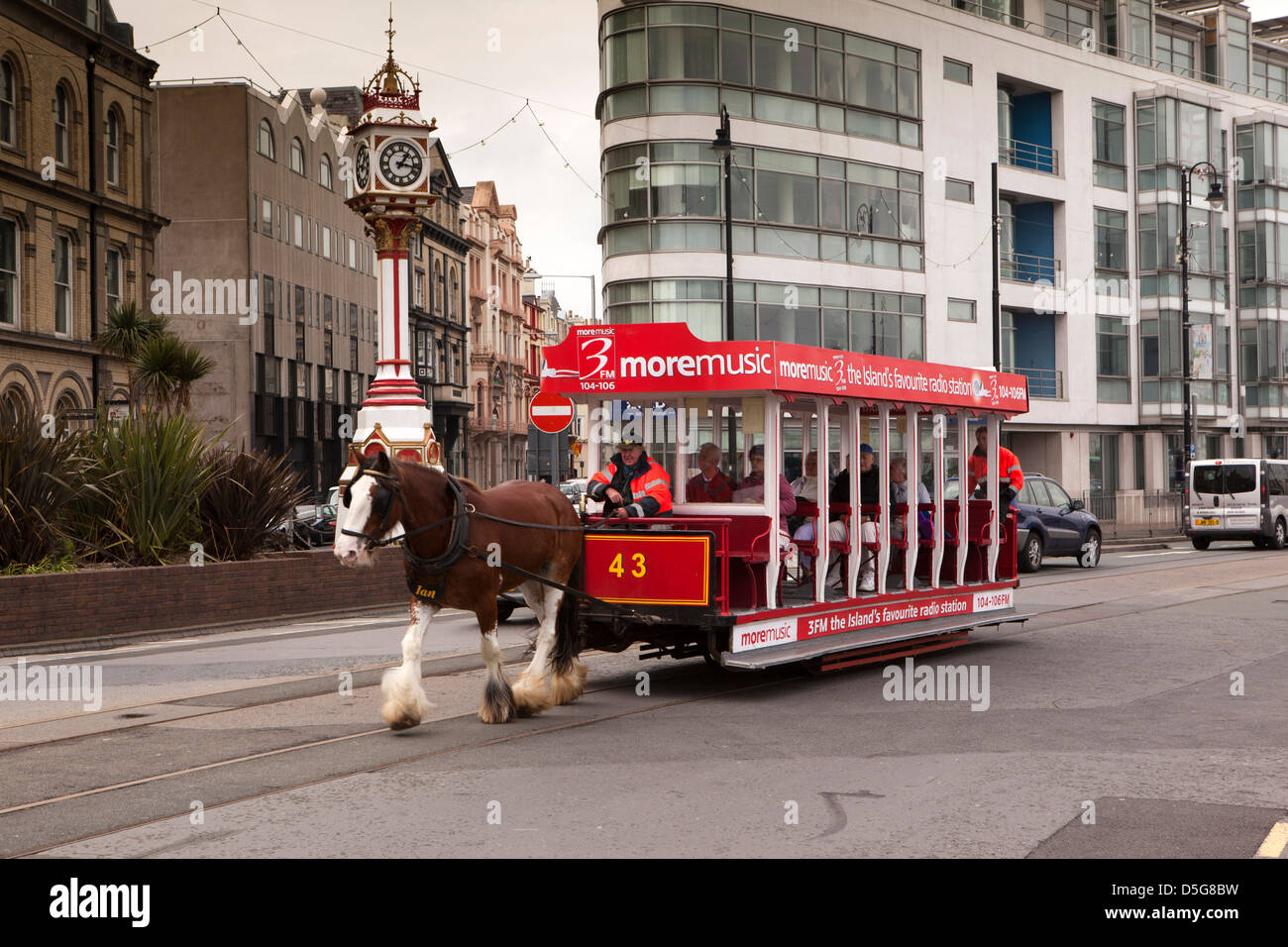Isle of Man, Douglas, Loch Prom, horse drawn tram passing the Victorian Jubilee Clock Stock Photo