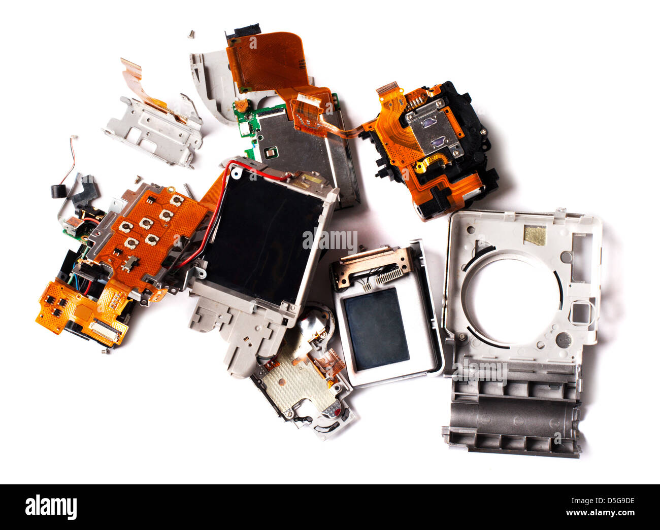 Broken compact digital camera parts prepared. Stock Photo