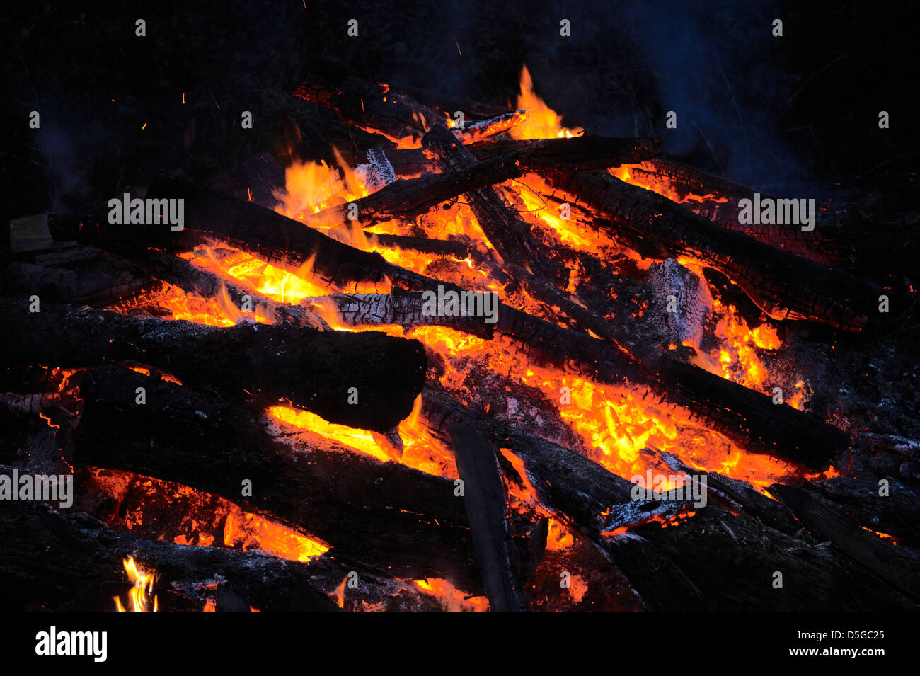 Glowing embers of a bonfire. Stock Photo