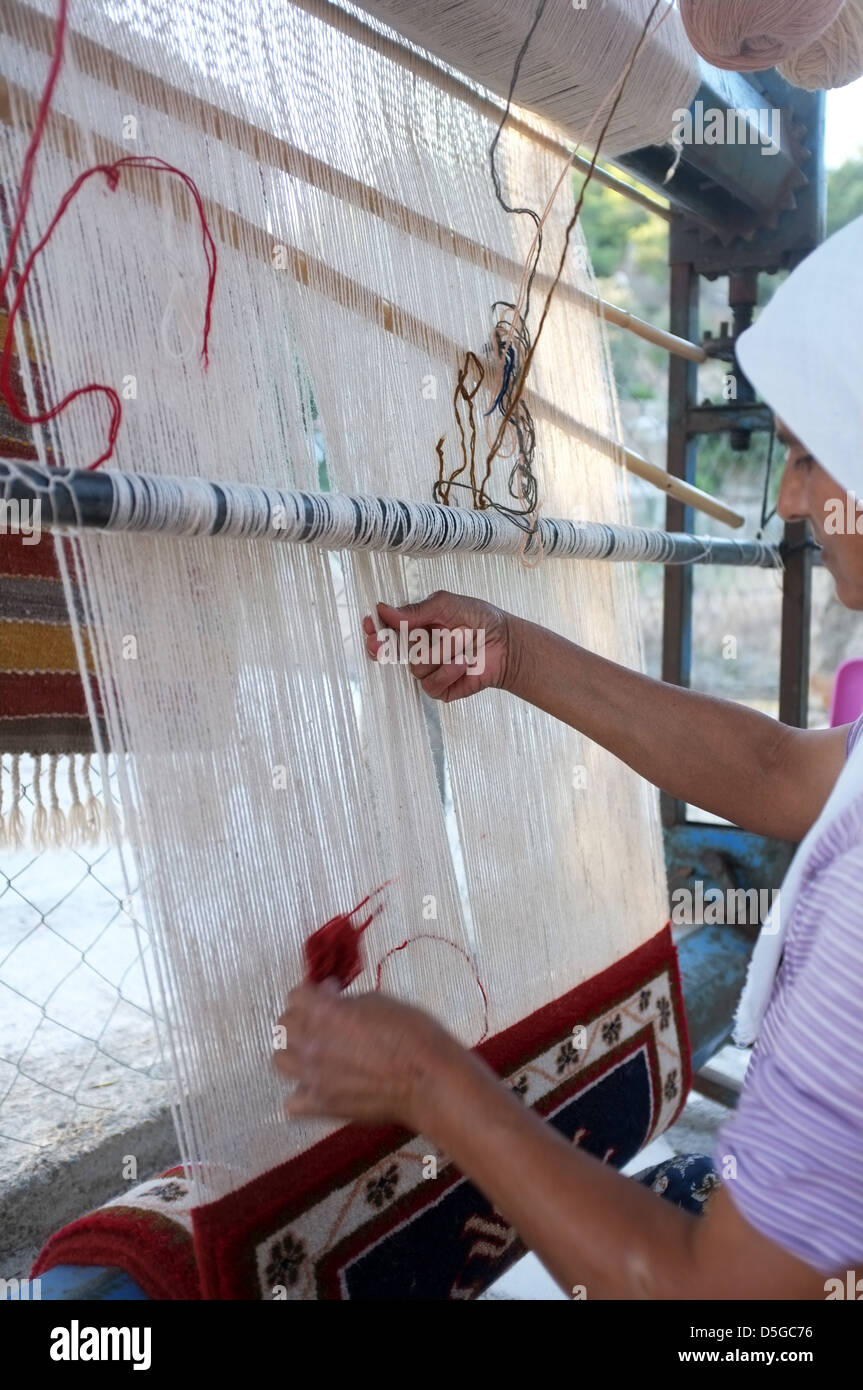 Traditional carpet maker Stock Photo Alamy