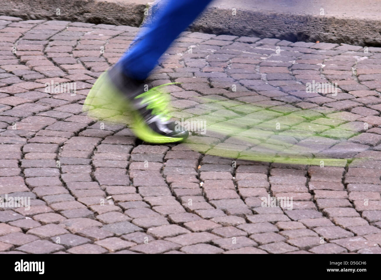 fast motion running shoe during the race in the city Stock Photo