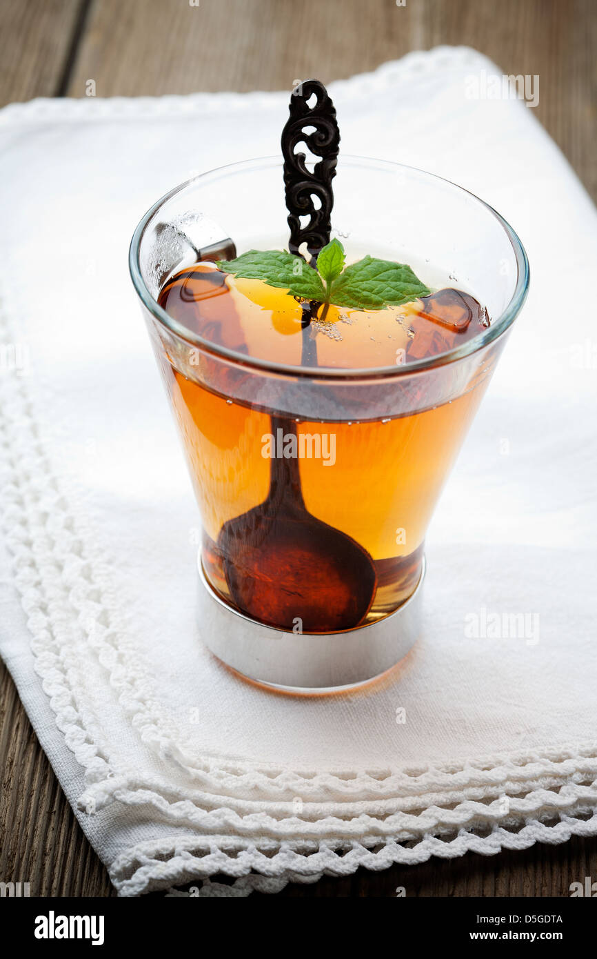 Fresh tea in glass with mint leaves Stock Photo