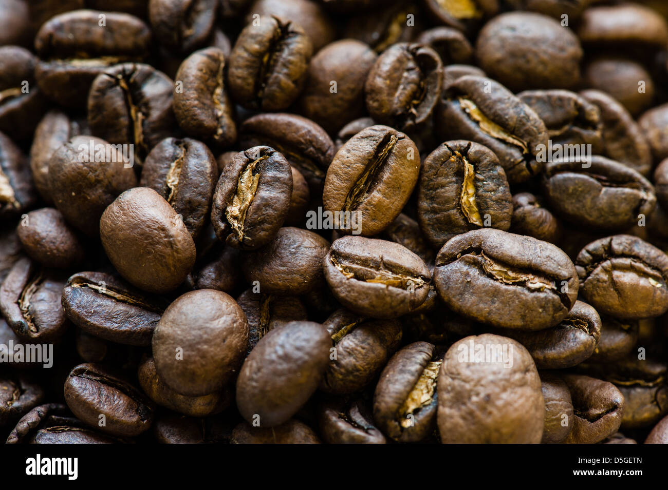 Freshly Roasted coffee beans in a pile Stock Photo - Alamy