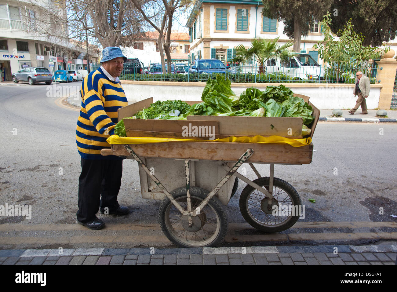 Street merchant selling lettuces on the streets of North Nicosia, Lefkosa, Cyprus Stock Photo