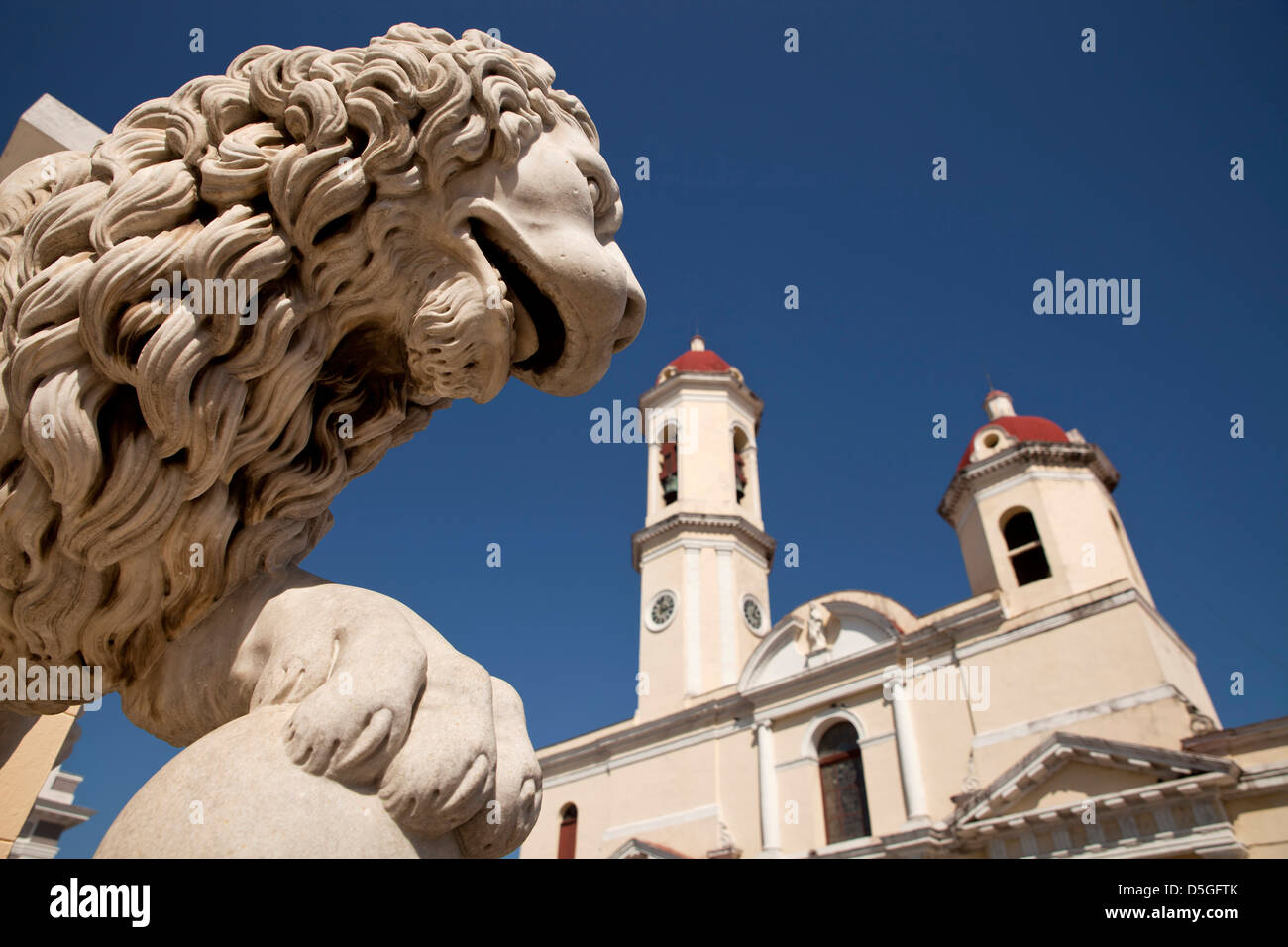 lions statue and the cathedral Cathedral de la Purisma Concepción in Cienfuegos, Cuba, Caribbean Stock Photo