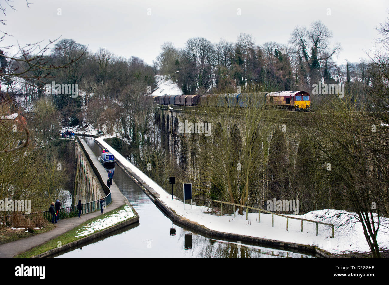 The Llangollen Canal aqueduct and the railway viaduct (with class 66 freight train), at Chirk on the Shropshire border with Wales, UK. Stock Photo