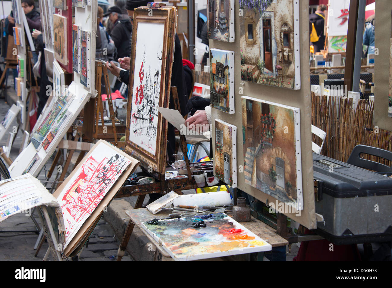 Artists at work in the famous Place du Tertre, Montmartre, Paris Stock Photo