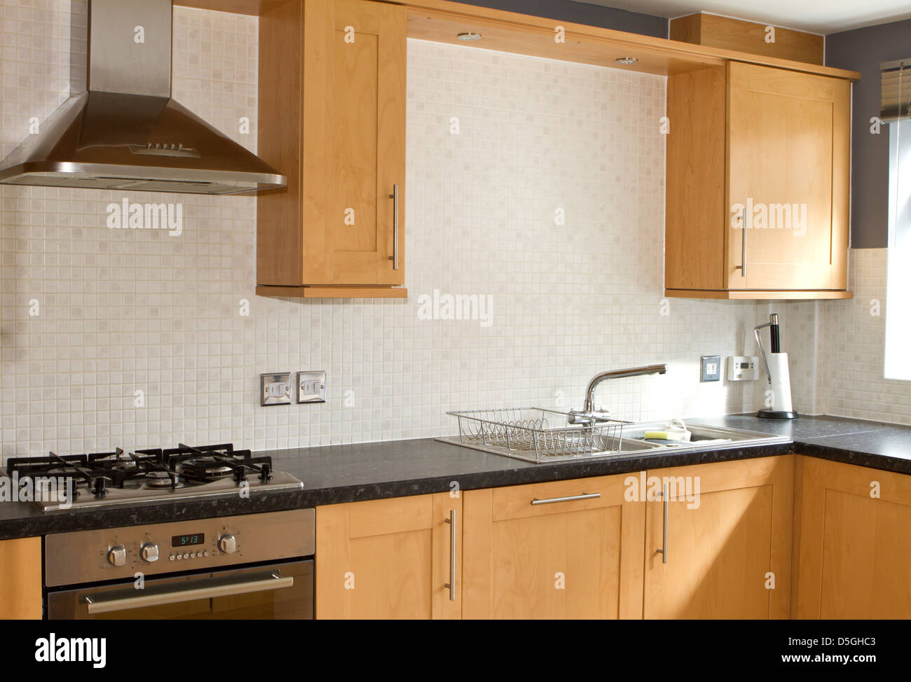 A typical modern kitchen in a new build English house Stock Photo