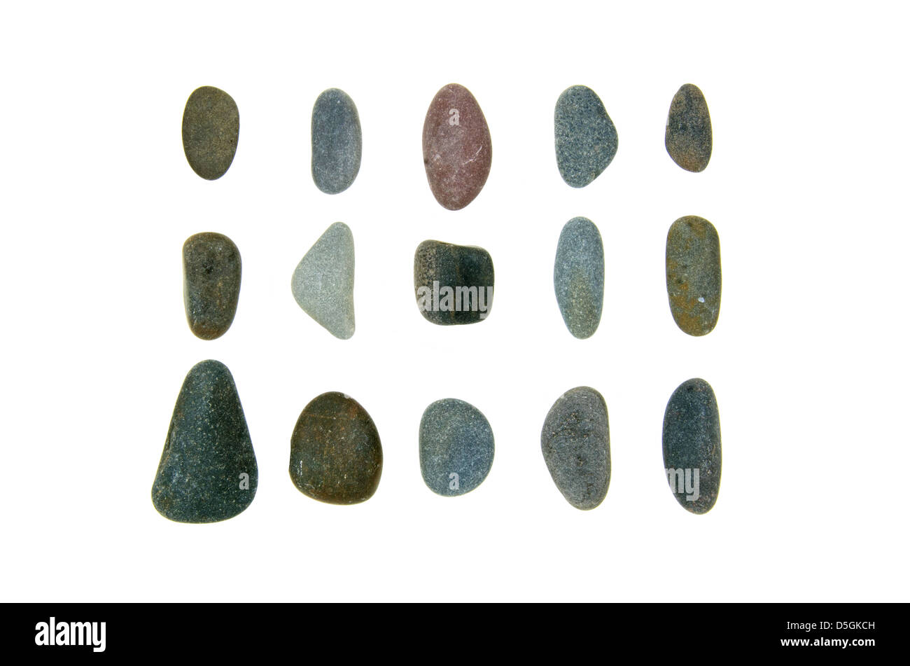 Fifteen smooth, round beach stones of Maine granite and schist. Stock Photo