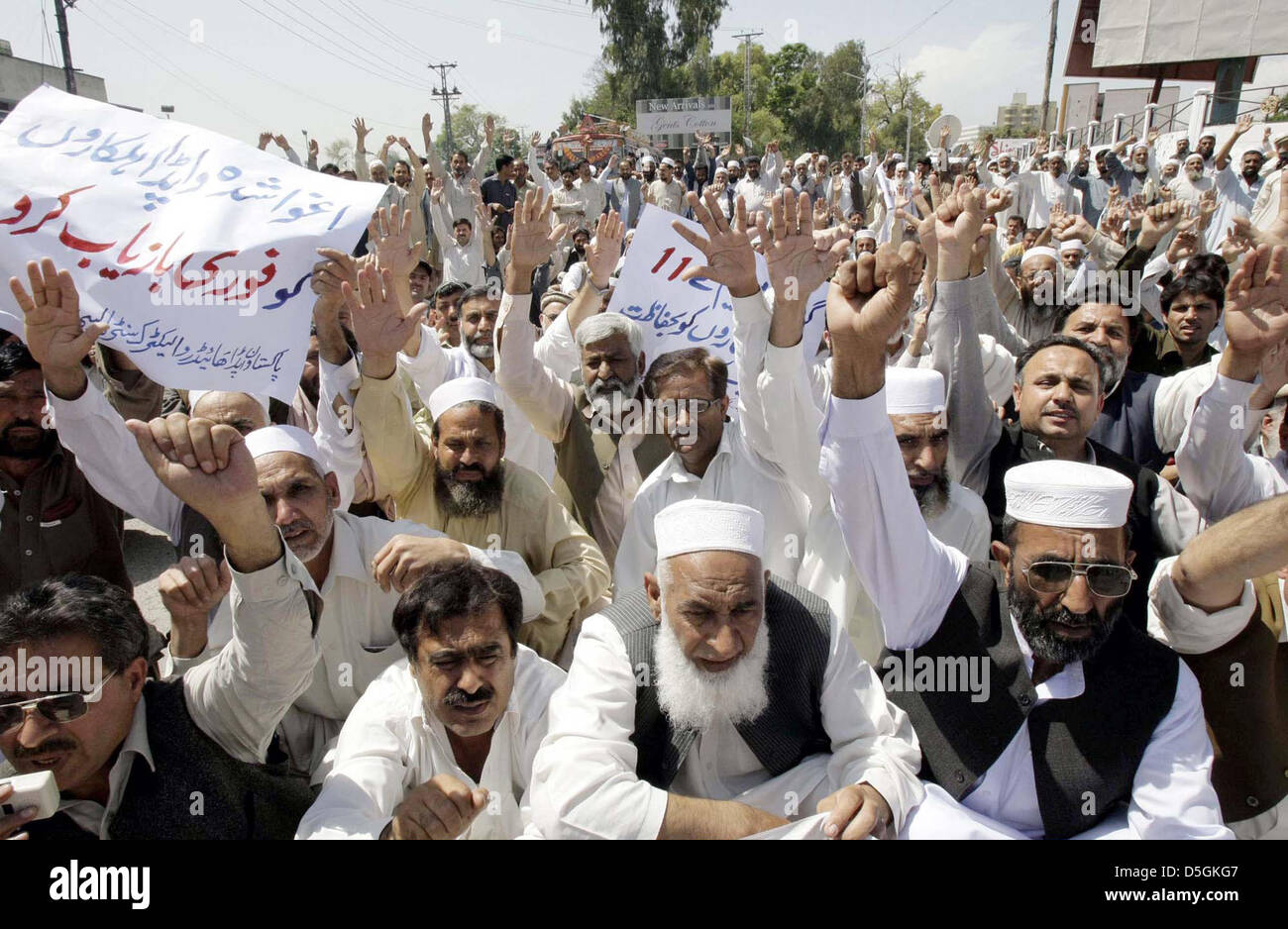 Pakistan. 2nd April 2013. Employees of Water and Power Development Authority (WAPDA) chant slogans against murder of their colleagues during attack on WAPDA Grid Station at Sheikh Mohammadi area and demanding to arrest accused during protest  demonstration in Peshawar. Credit: Asianet-Pakistan / Alamy Live News Stock Photo