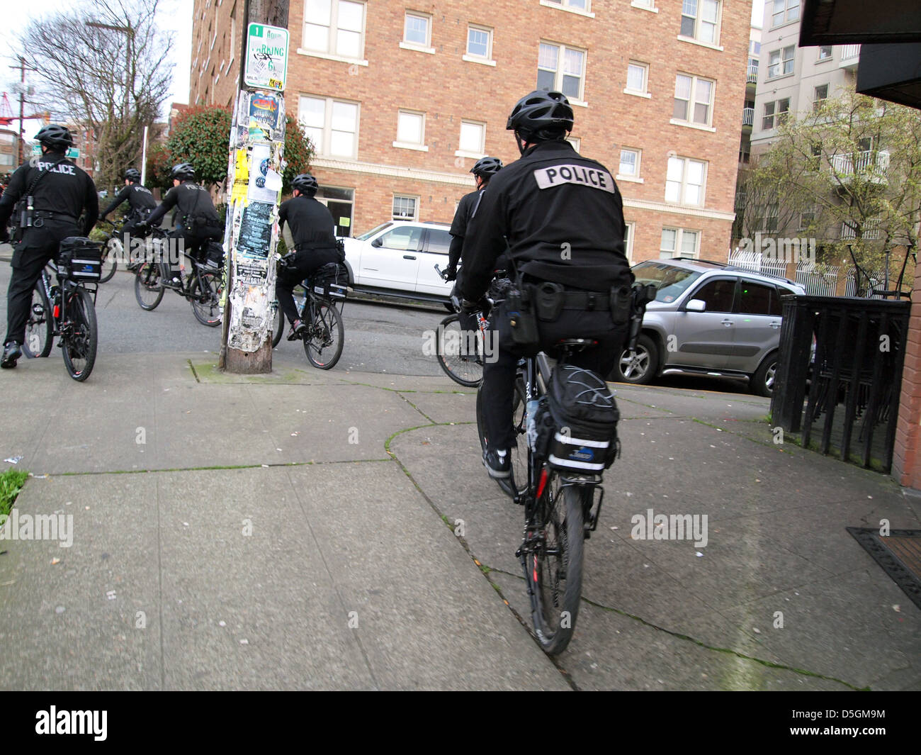 Seattle police cycle cops at an anti-police demo in Seattle Washington, USA Stock Photo