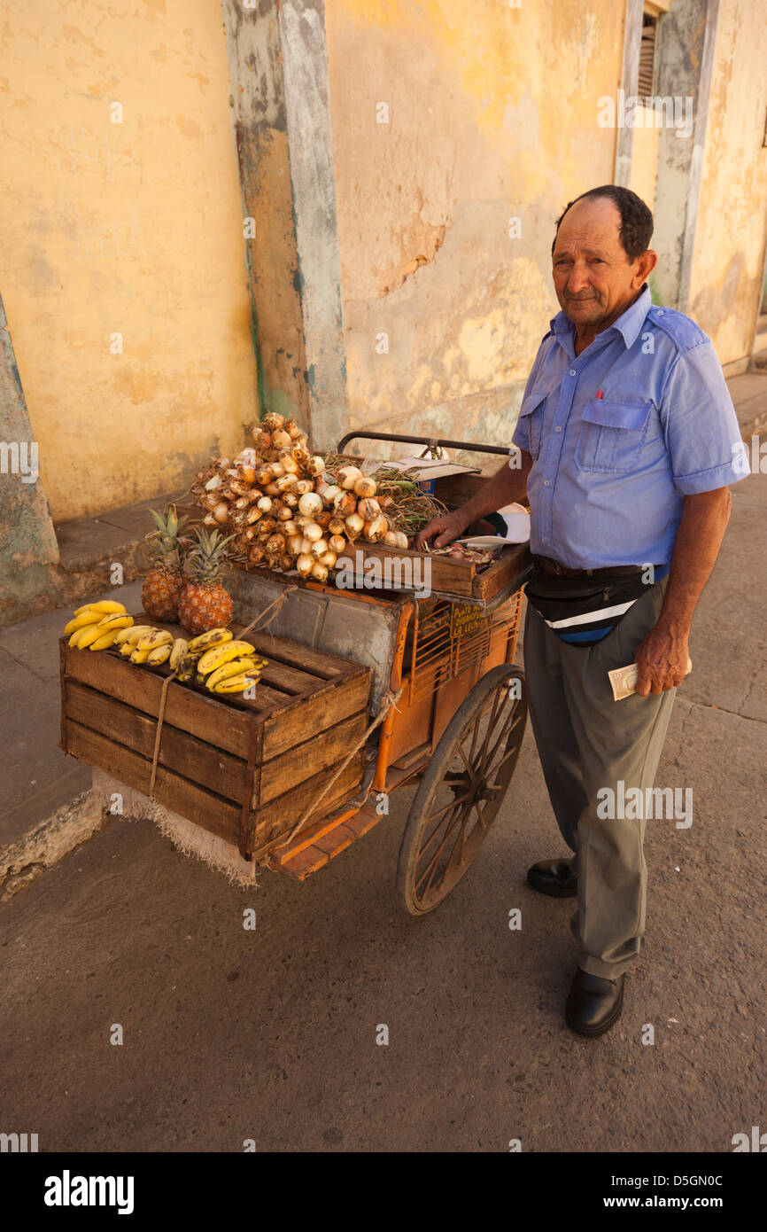 Cuba, Sancti Spiritus Province, Trinidad, fruit vendor. Stock Photo