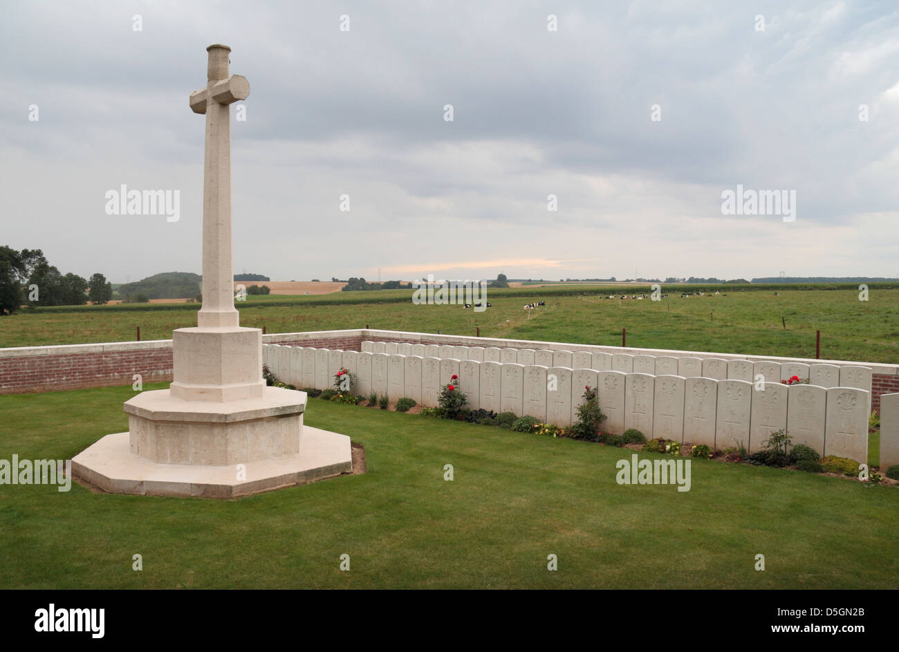 Cross of Sacrifice and headstones in Morval British Cemetery, Pas de Calais, Picardy, France. Stock Photo