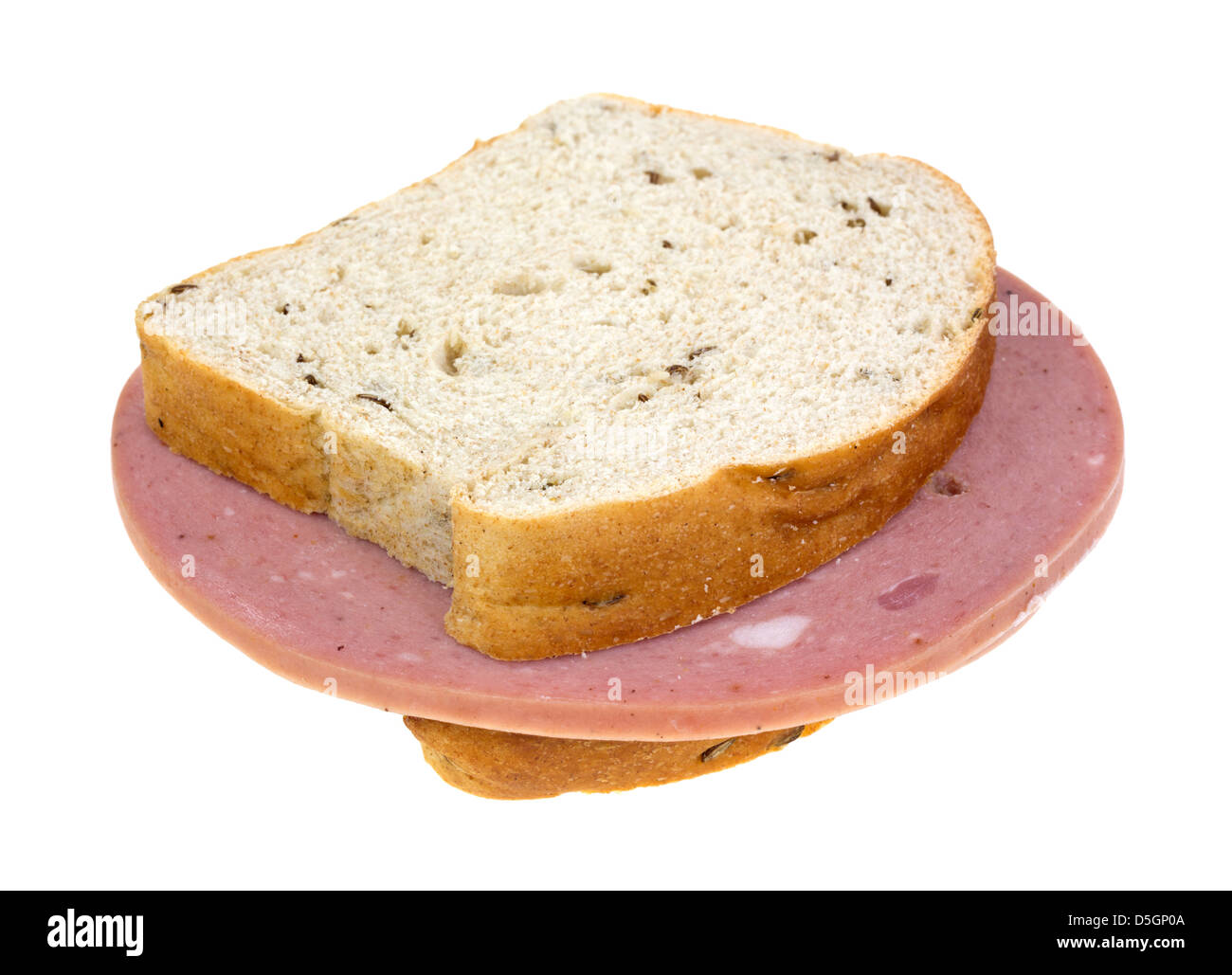 Two slices of mortadella luncheon meat on seeded rye bread Stock Photo