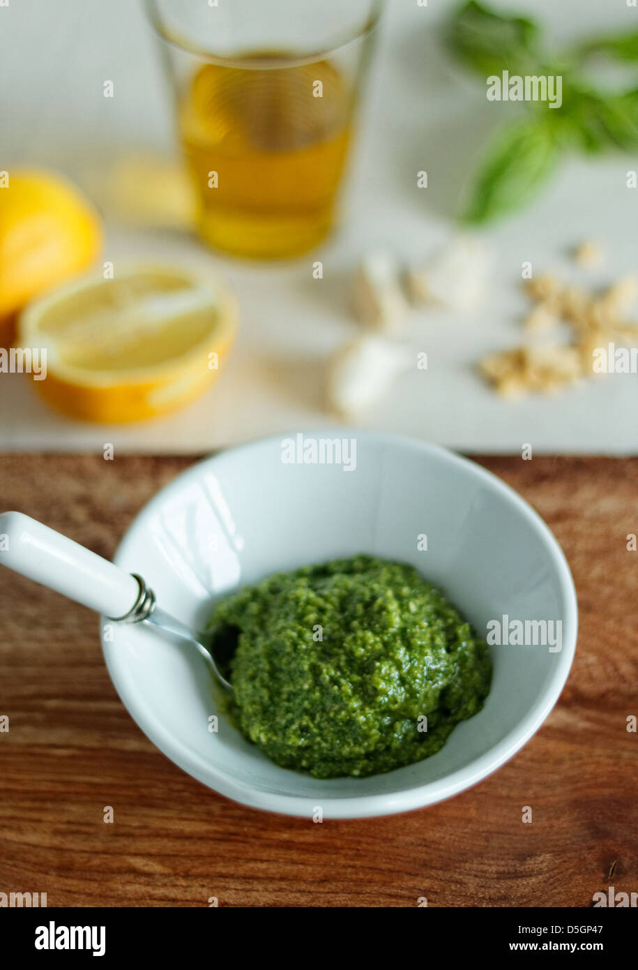 Basil pesto with ingredients Stock Photo Alamy
