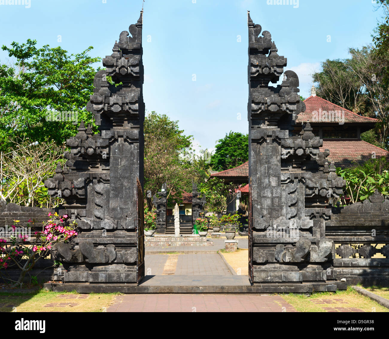 Traditional Balinese gate Candi Bentar in Goa Lawah Bat Cave temple, Bali, Indonesia Stock Photo