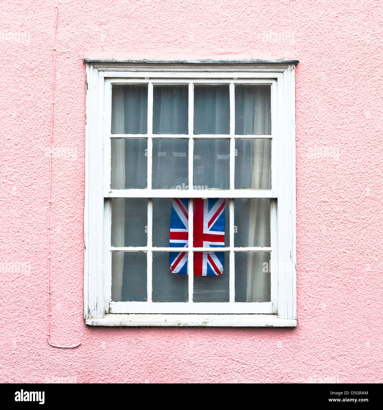 Brish flag hanging in a window in a Suffolk cottage Stock Photo