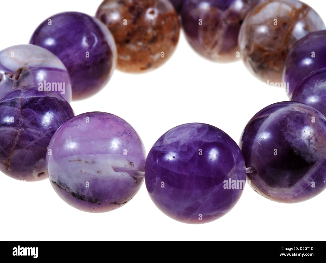 string of round amethyst necklace close up isolated on white background ...