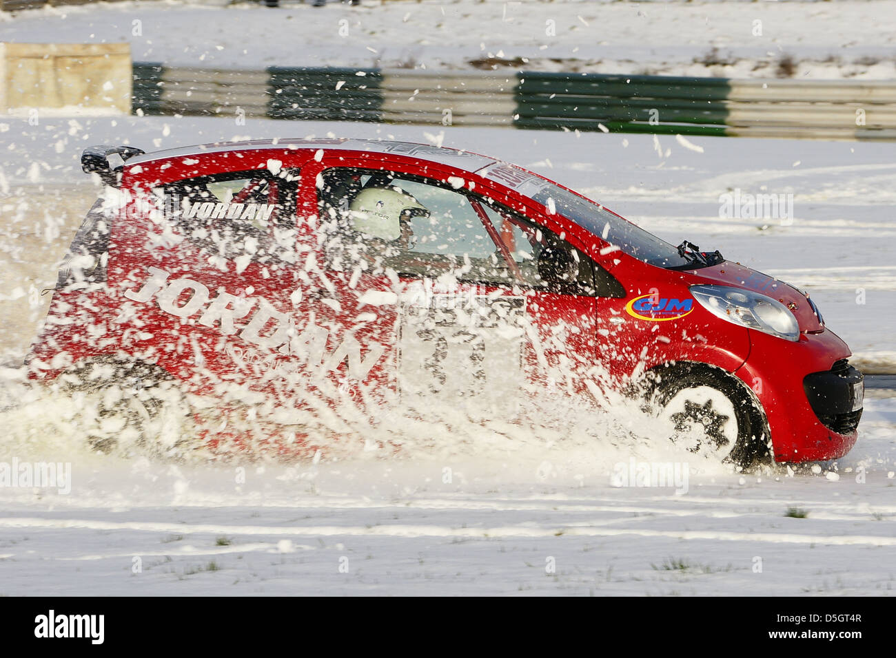 Citroen C1 rally car in deep snow at Mallory Park, Leicestershire, UK Stock Photo
