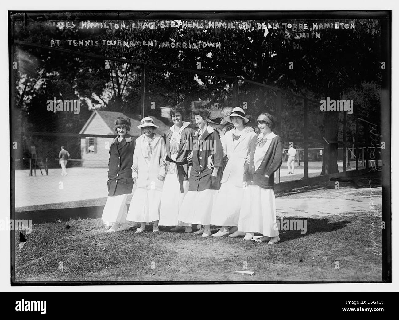 At tennis tournament, Morristown - Misses Hamilton, Crag, Stephens, Hamilton, [Gertrude] Della Torre, Hamilton and Smith (LOC) Stock Photo