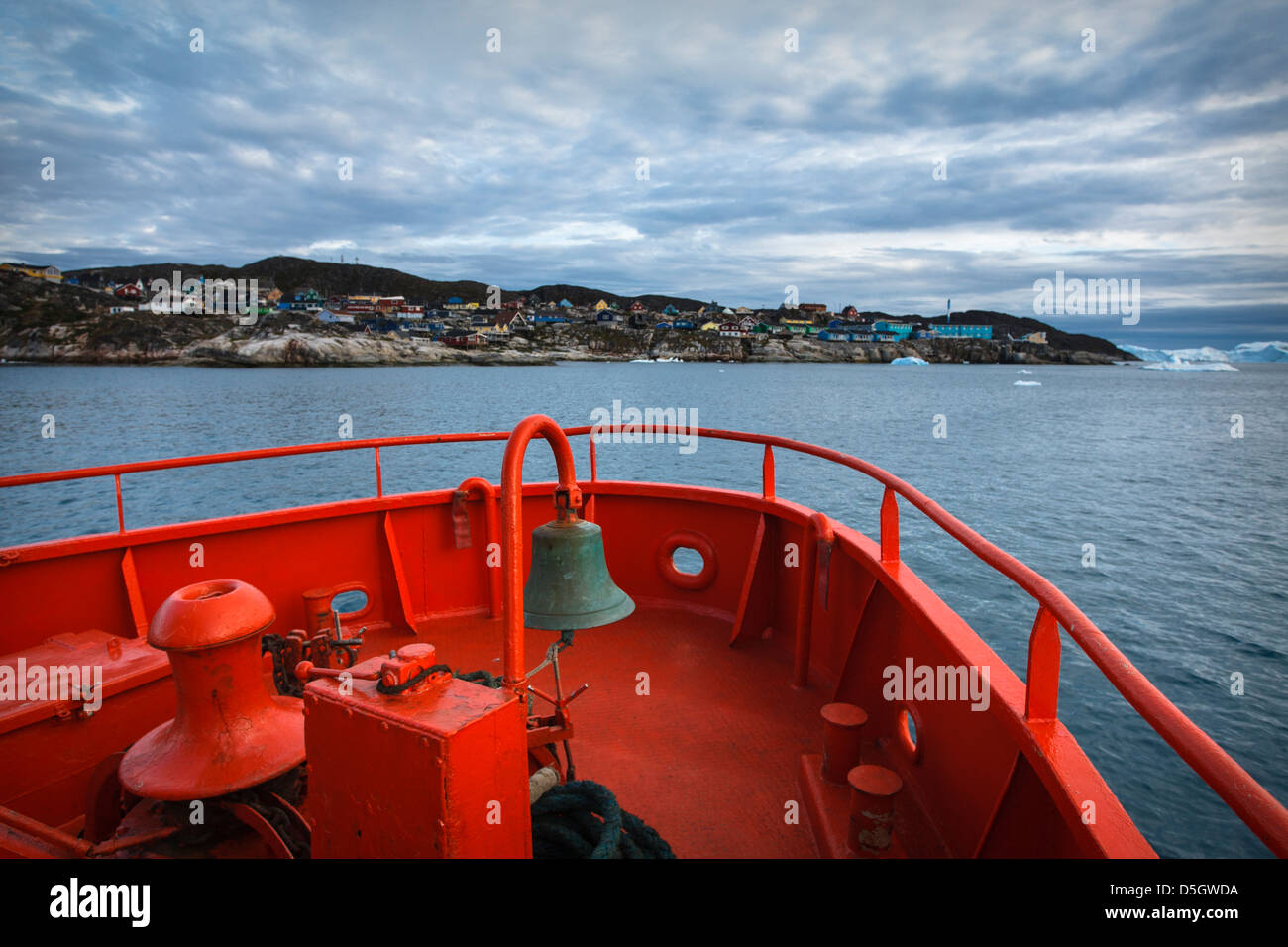Boat heading off for Icebergs by night tour, Ilulissat (Jakobshavn), Greenland Stock Photo