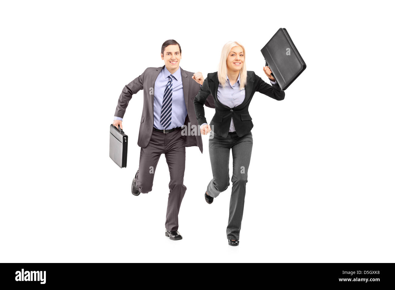 Full length portrait of a businesspeople with briefcases running isolated on white background Stock Photo