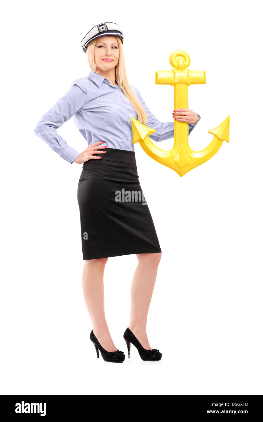 Full length portrait of a young sailor woman with an anchor, isolated on white background Stock Photo