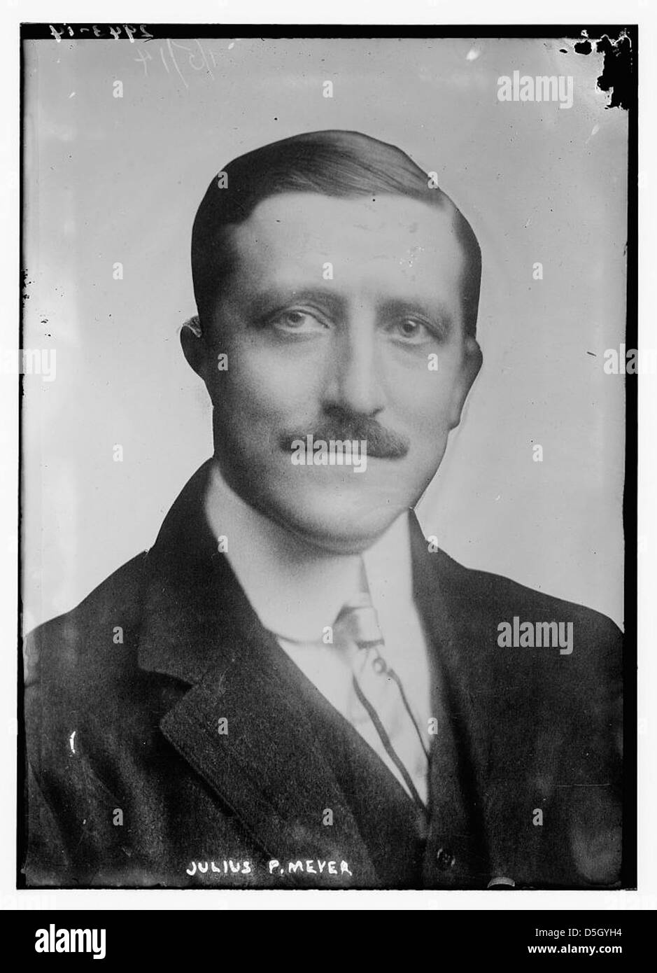 Julius P. Meyer, associated with the Hamburg-Amerikanische Packetfahrt-Actien-Gesellschaft (HAPAG), is captured in this portrait from the early 20th century, reflecting his involvement in the shipping industry. Stock Photo