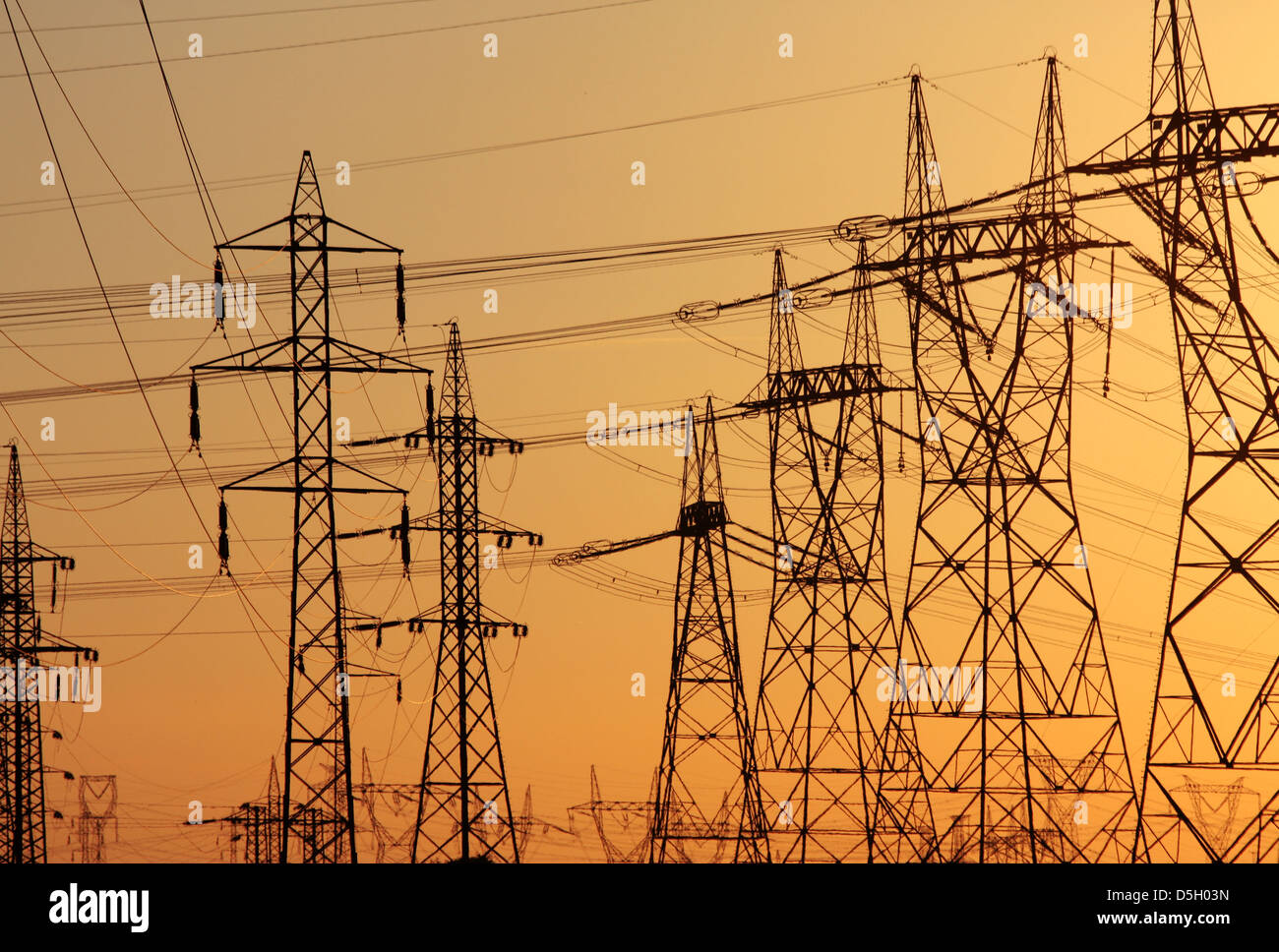 high voltage transmission tower during sun set Stock Photo - Alamy