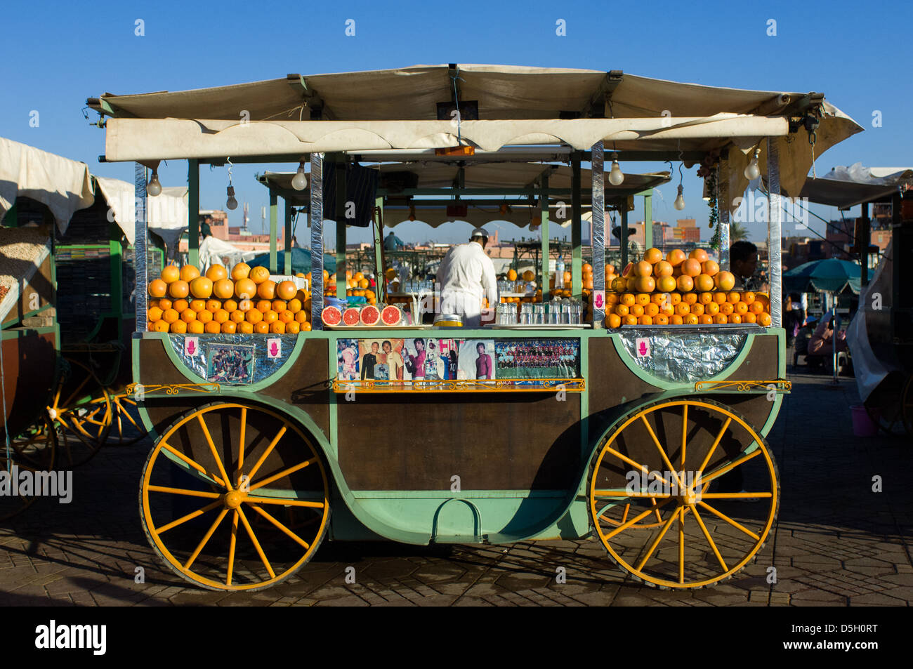 Cart selling fresh orange juice in the Djemaa elFna square, Marrakech