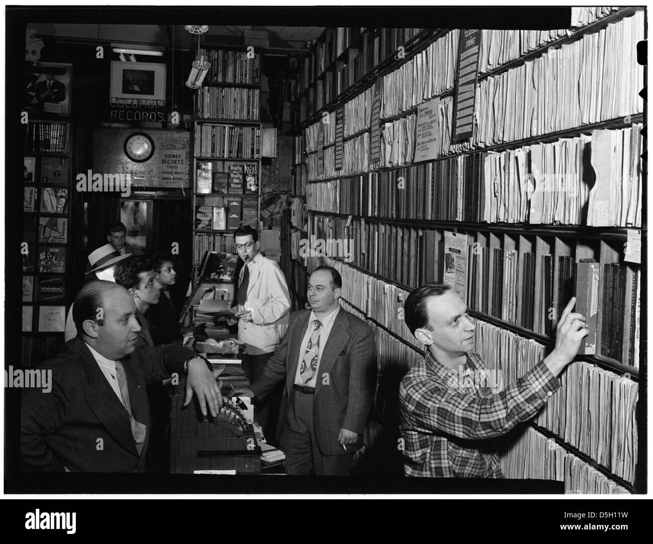 [Portrait of Milt Gabler, Herbie Hill, Lou Blum, and Jack Crystal, Commodore Record Shop, New York, N.Y., ca. Aug. 1947] (LOC) Stock Photo
